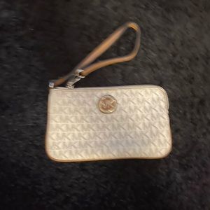 MK wristlet in white and cream